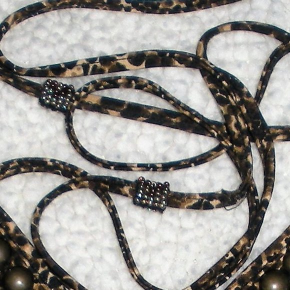 Guess like new Organic African print backless top with hand beaded accents. - Picture 7 of 7